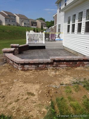 Stamped Brick-Pattern Patio with Raised Seating