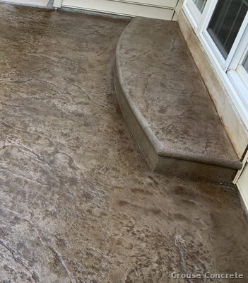 Broom-Finish Concrete Patio with Curved Bench