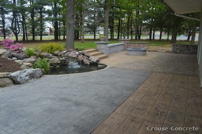 Stamped Concrete Patio with Stone Seating